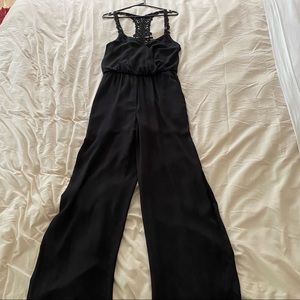 BCX Black V-Neck Sleeveless Jumpsuit With Macrame Straps